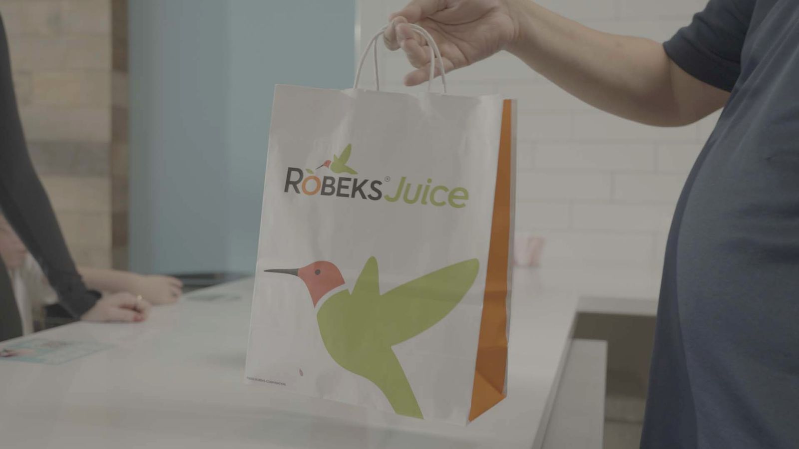 Robeks team member preparing an order