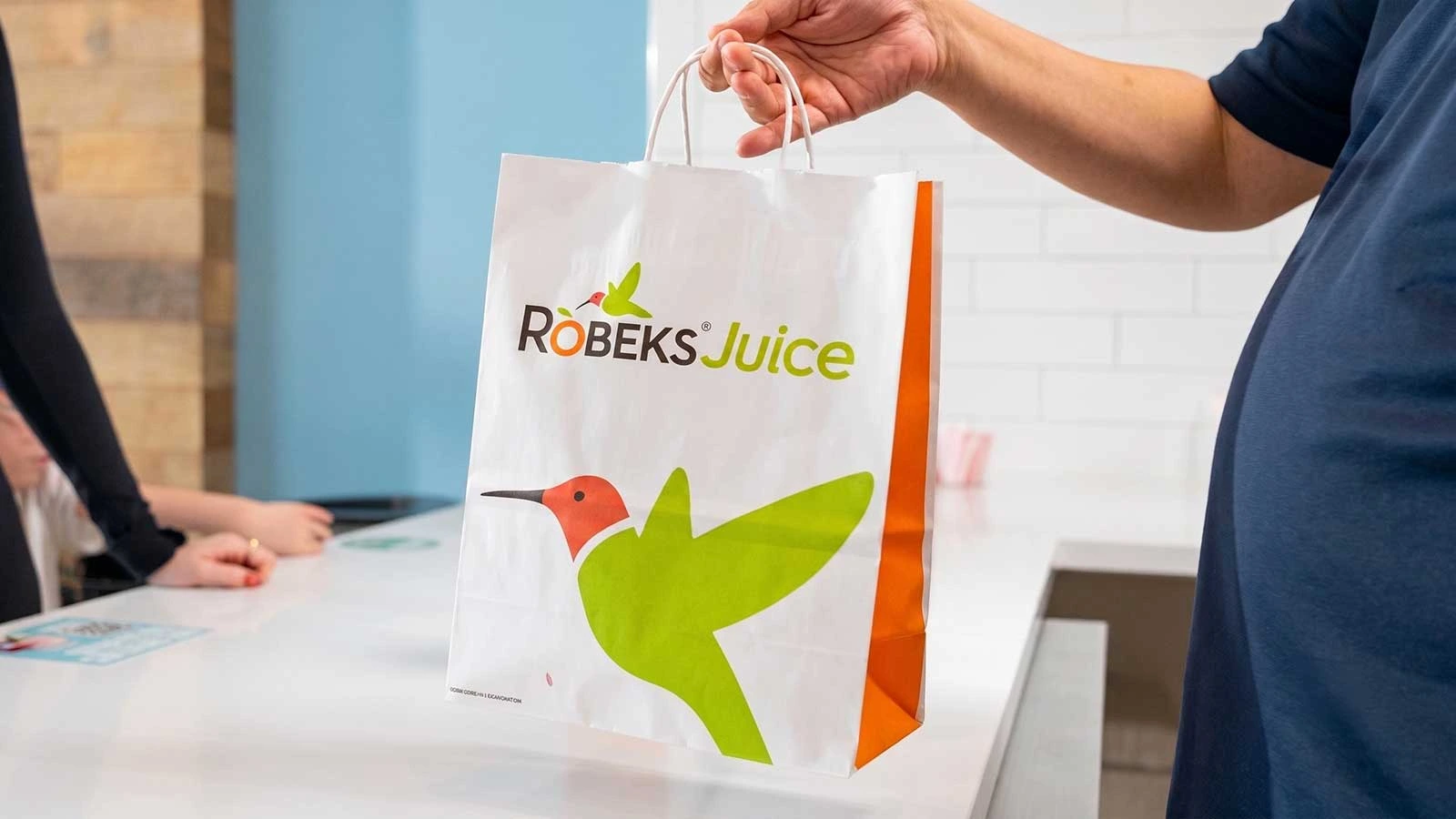 Robeks team member preparing an order